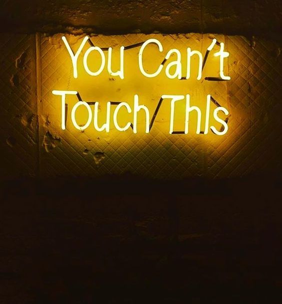 a neon sign that says you can't touch this