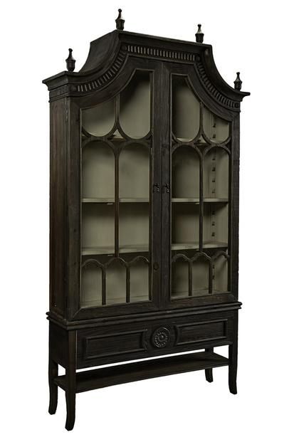 an antique china cabinet with glass doors on the front and bottom shelves, in dark wood