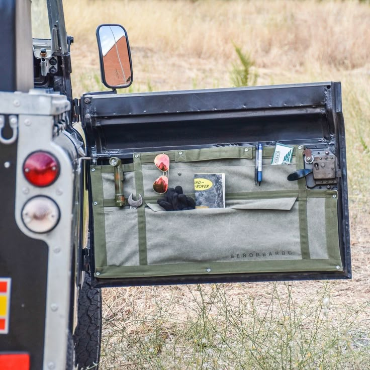 the back end of a truck with its door open