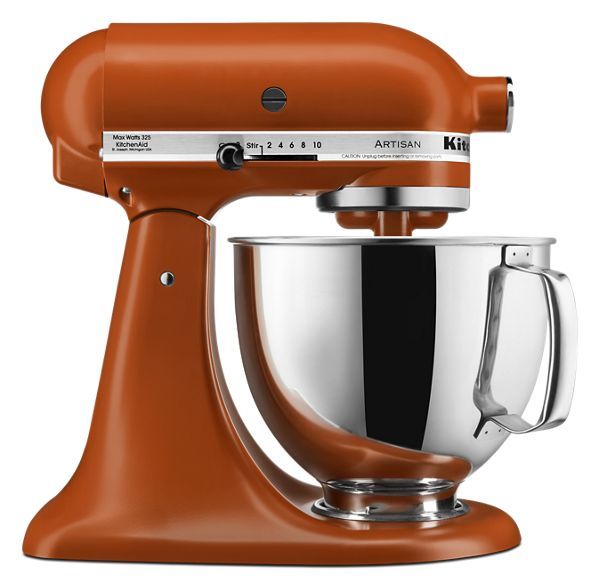 an orange kitchen mixer on a white background