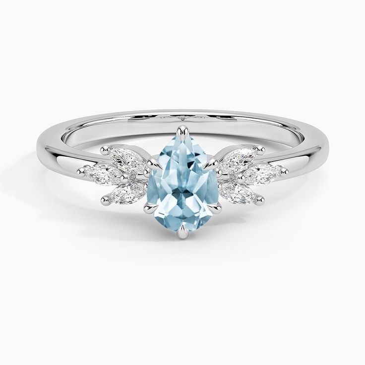 an oval blue topazte and diamond ring