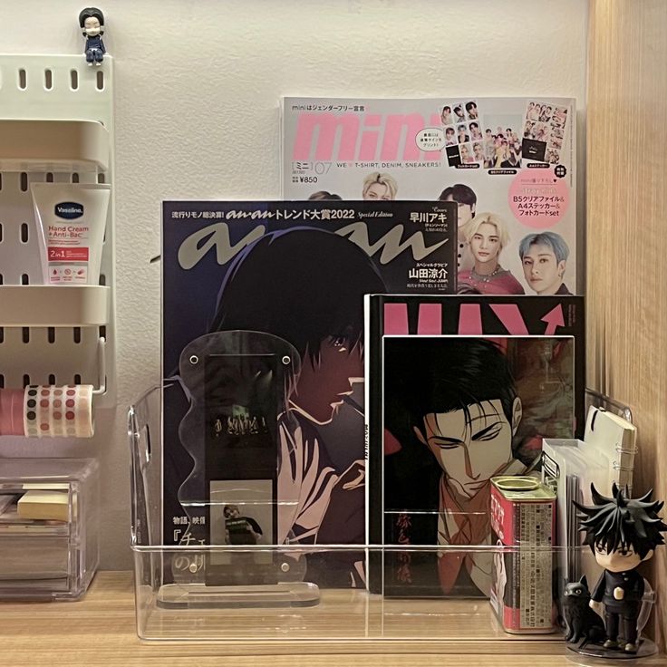 a shelf with various items and magazines on it