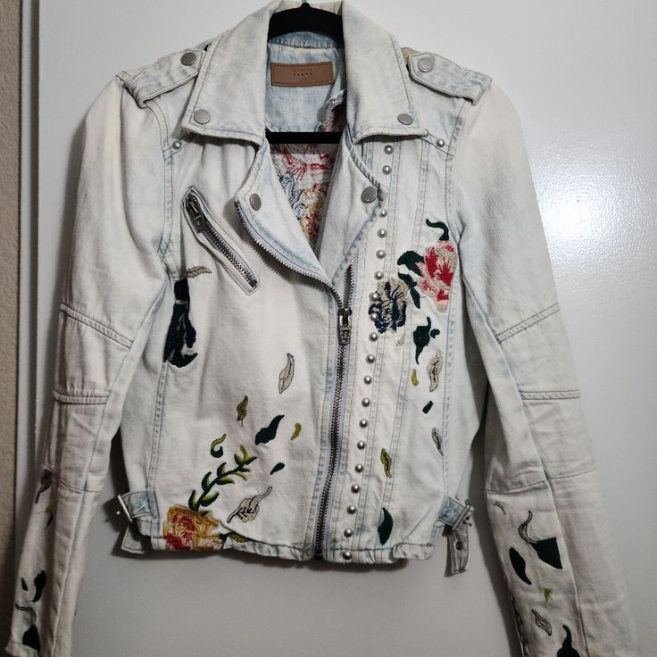 Gorgeous Jean Jacket, Was Worn Once, Brand New Condition.Too Small Otherwise I Would Leave It. Size Small Casual White Biker Jacket For Spring, Casual White Embroidered Denim Jacket, Cotton Long Sleeve Biker Jacket For Spring, Trendy Cotton Biker Jacket For Spring, Casual Long Sleeve Biker Jacket For Spring, Embroidered Long Sleeve Biker Jacket For Spring, Casual Long Sleeve Biker Jacket With Floral Embroidery, White Embroidered Denim Jacket For Fall, Casual White Biker Jacket For Fall