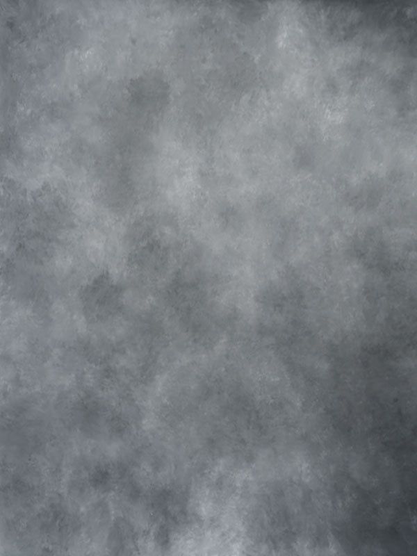 a black and white photo with some clouds in the sky behind it on a gray background