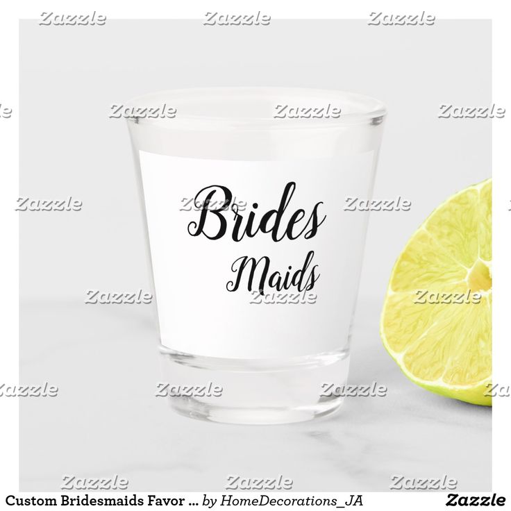 a shot glass with the words twenty and nine on it next to a lemon slice