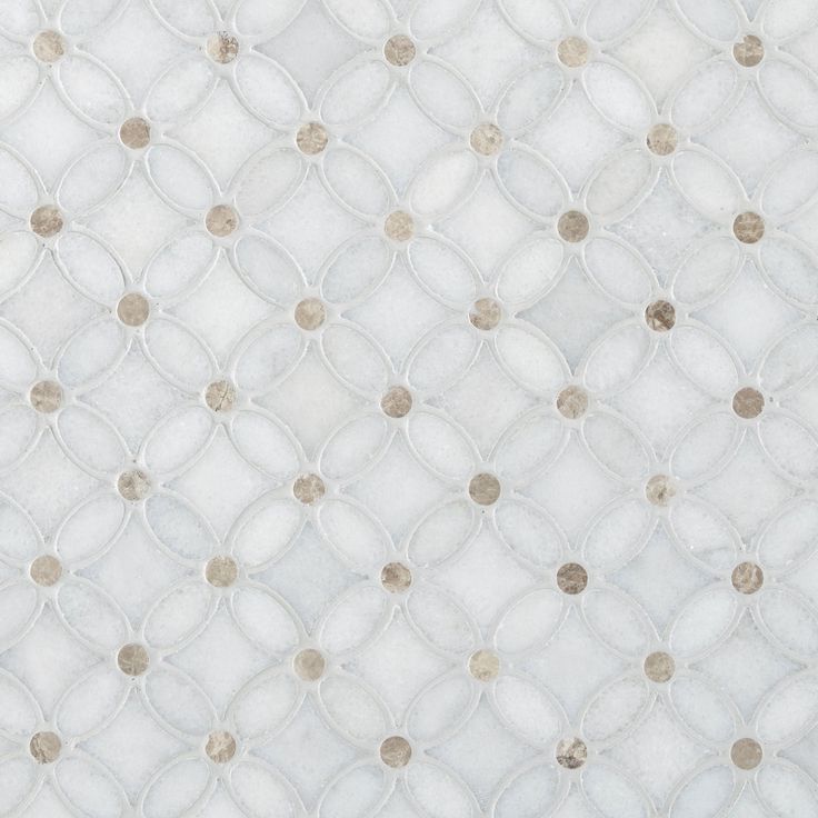 a white rug with circles and dots on it