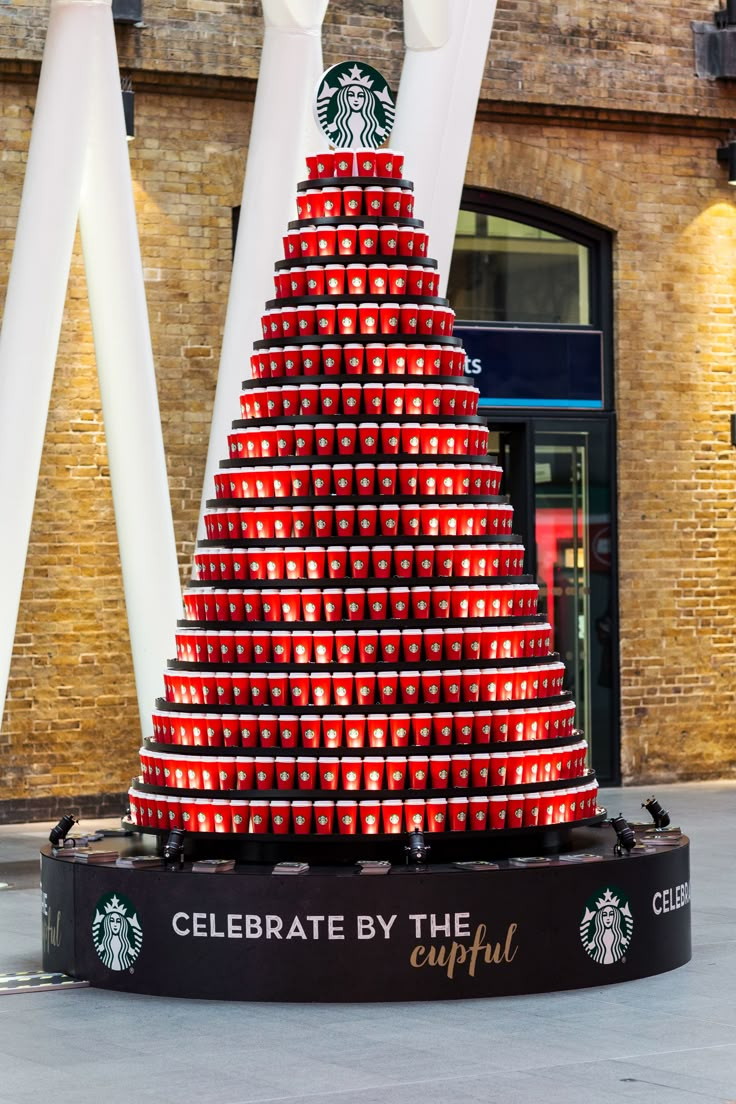 a christmas tree made out of starbucks cups