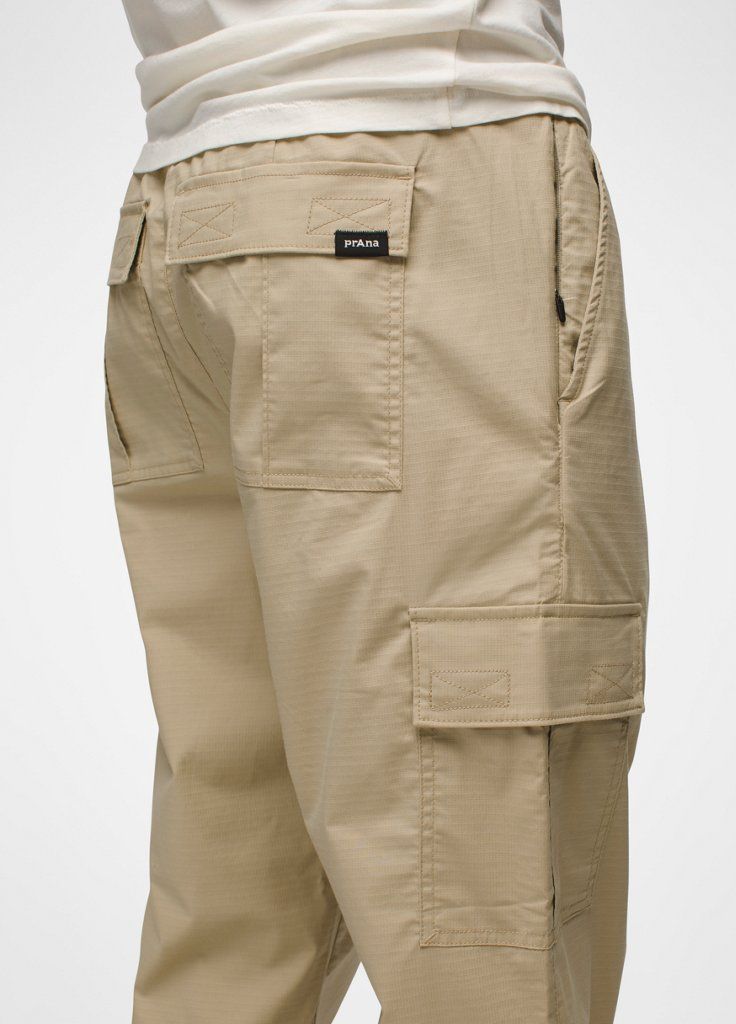 Utility-inspired cargo pants made with durable cotton ripstop and plenty of pockets for on-the-go storage. Functional Cotton Pants With Side Pockets, Urban Parachute Pants With Patch Pockets For Outdoors, Khaki Parachute Pants With Patch Pockets For Outdoor, Practical Cargo Pants With Multiple Pockets For Outdoor, Techwear Bottoms With Patch Pockets For Outdoor Activities, Techwear Bottoms With Patch Pockets For Outdoor, Cotton Pants With Functional Pockets, Functional Cotton Cargo Pants, Functional Cargo Jeans With Side Pockets For Outdoor Activities