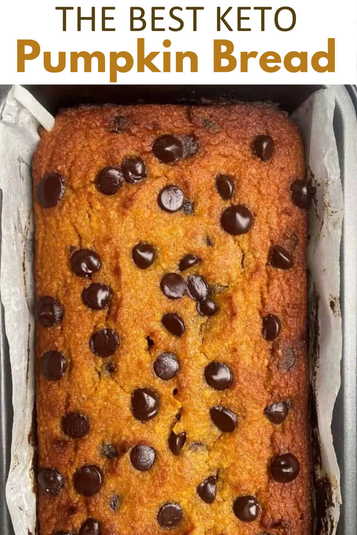 Top view of pumpkin bread with sugar free chocolate chips Pumpkin Bread With Almond Flour Low Carb, Keto Banana Pumpkin Bread, Low Carb Pumpkin Chocolate Chip Bread, Low Carb Pumpkin Bread Easy, Keto Breakfast Bread Recipes, Best Keto Pumpkin Bread, Keto Pumpkin Chocolate Chip Bread, Keto Pumpkin Zucchini Bread, Low Carb Pumpkin Bread Recipes