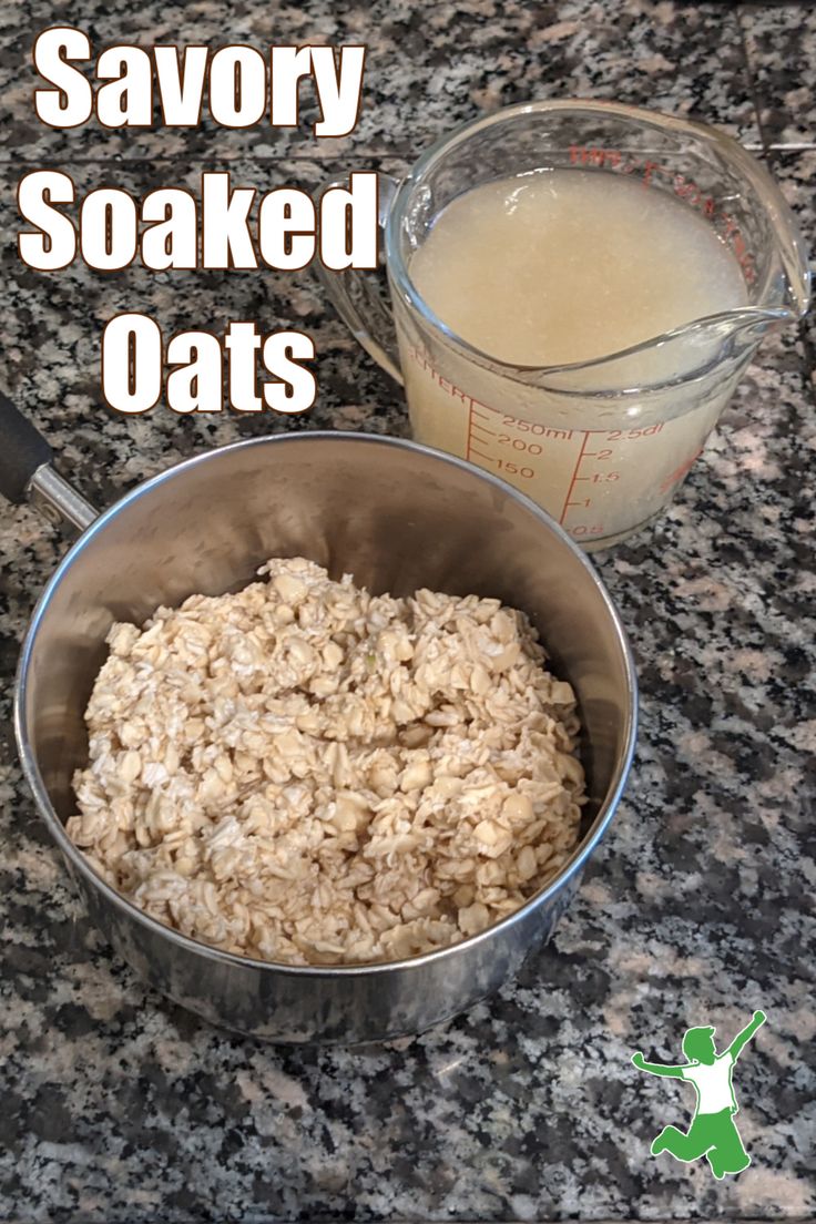 a bowl of oatmeal next to a measuring cup on a granite counter