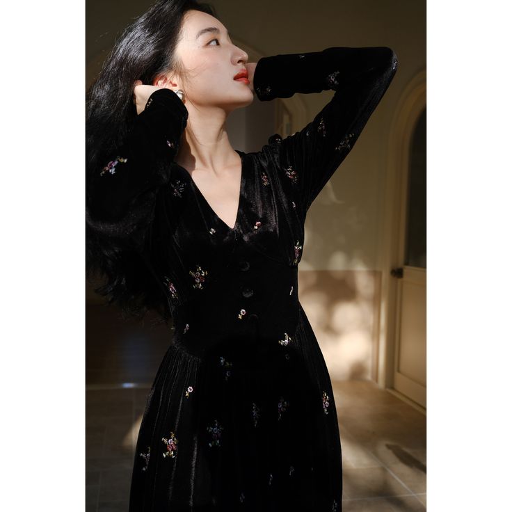 A velvet dress embroidered with brightly blooming flowers. The pretty flowers floating on the black are beautiful, giving off a gorgeous, dazzling and elegant shine. The glossy drape enhances the elegant atmosphere. 
 
 
 Size 
 
 XS size 
 
 Length: 112.5cm 
 Shoulder width: 33cm 
 Bust: 70cm 
 Waist: 56cm (*Stretchable) 
 Sleeve length: 63cm 
 
 S size 
 
 Length: 114cm 
 Shoulder width: 34cm 
 Bust: 74cm 
 Waist: 60cm 
 (*Stretchable) 
 
 Sleeve length: 64cm 
 
 M size 
 
 Length: 115.5cm 
 S Blooming Flowers, Black Is Beautiful, Velvet Dress, Embroidery Flowers, Jet Black, Pretty Flowers, Sleeve Length, Velvet, Embroidery