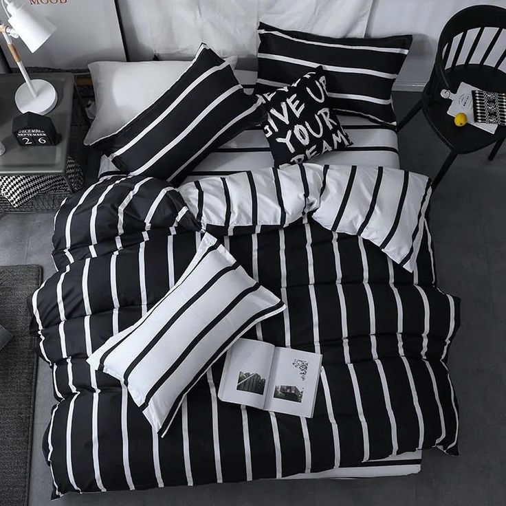 black and white striped bedding with pillows