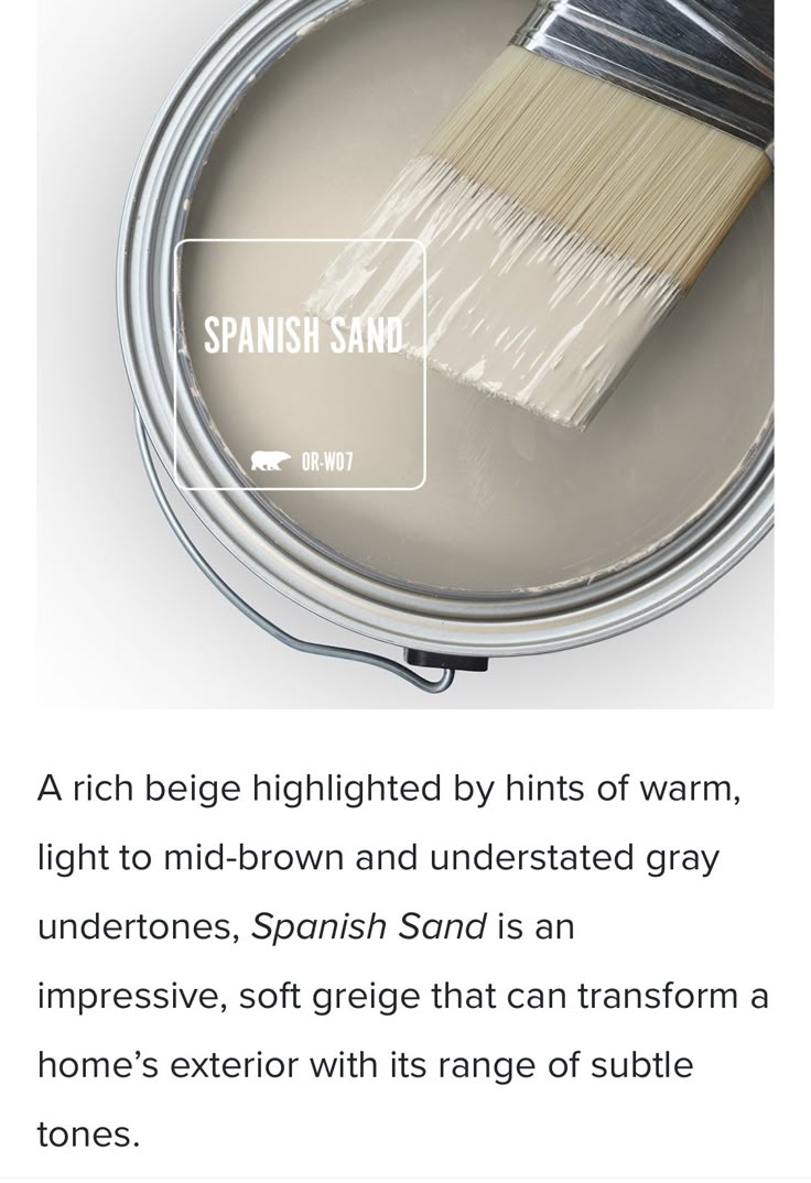 a paint can with a brush in it and the words spanish sand written on it