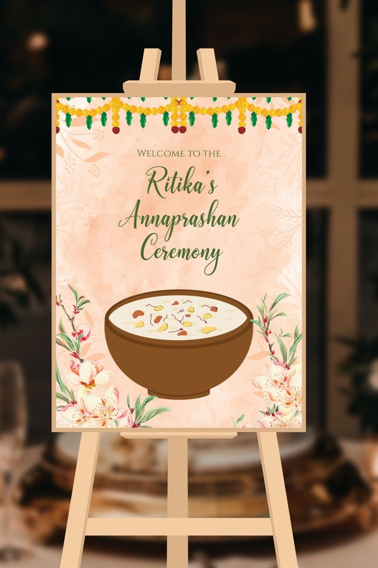 a wooden easel holding a sign that says, welcome to the rishika's angapphan ceremony