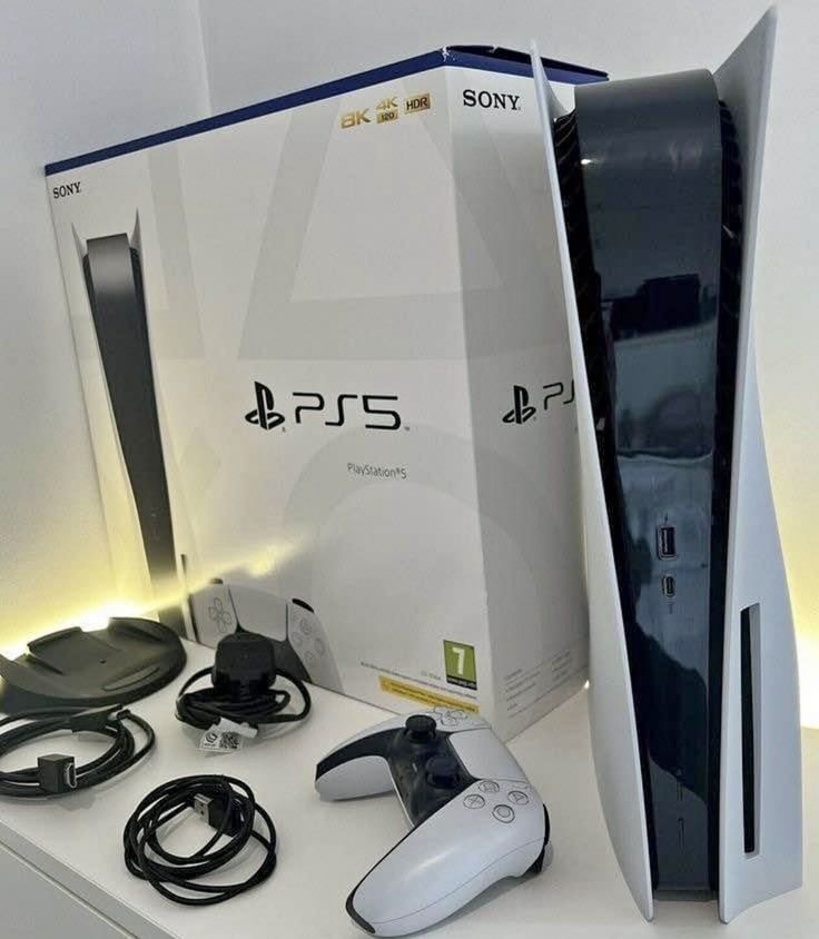 an image of a video game console and accessories on display in a store window or showroom