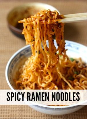 noodles in a bowl with chopsticks sticking out of it and the words spicy ramen noodles