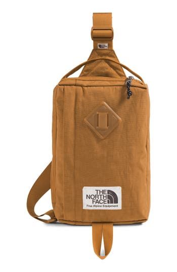 the north face back pack in caramel, with an adjustable strap and two pockets