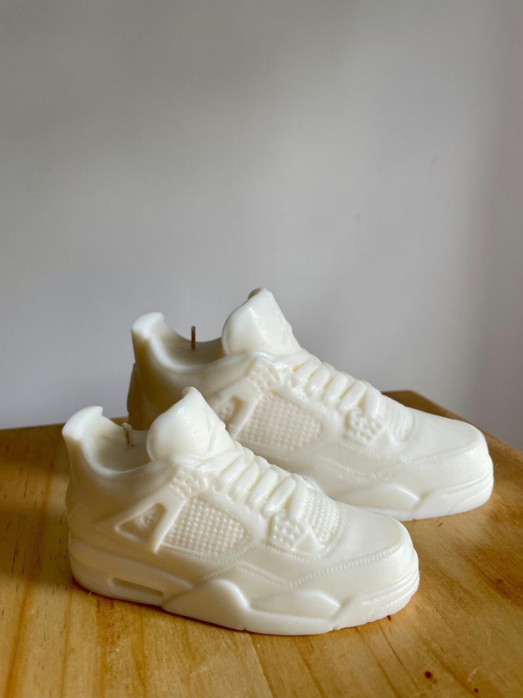 Made from all-natural soy wax, our Large AJ 4 Sneaker Candle is 18CM and makes the perfect present for all your sneakerheads out there! All candles are made to order and dispatch within 1-3 days. For large wholesale orders message us directly as we do wholesale pricing - our candles make the best wedding and christening favours too! The candles can be used for decoration or burning. If you decide to burn them, we advise you use a plate. *Please note that our candles are unique and hand-poured, so minor imperfections can occur. White Sporty Sneakers, Sneakerhead Wedding, Christening Favors, Adidas Tubular Defiant, Natural Soy Wax, Fragrance Candle, Sneaker Head, Candle Making, Home Fragrances