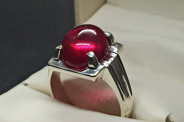 Cabochon Deep Red Ruby Sterling Silver 925 Handmade Women Elegant Ring Product: Ring Gemstone: Ruby Color: Red Handmade Ring It is heated and treated (lab created) but High Quality Ruby with pure 925 Sterling Silver Handmade Ring. Fine Jewelry White Gold Cabochon Ruby Ring, Fine Jewelry Ruby Cabochon Ring In White Gold, Fine Jewelry Cabochon Ruby Ring In White Gold, Fine Jewelry White Gold Ruby Ring With Cabochon, Ruby Cabochon Round Jewelry, Formal Ruby Signet Ring, Luxury Silver Ruby Cabochon Ring, Red Gemstone Rings In Sterling Silver, Classic Polished Gemstones As A Gift