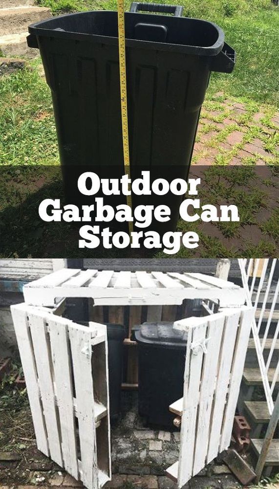 an outdoor garbage can storage area made out of pallets