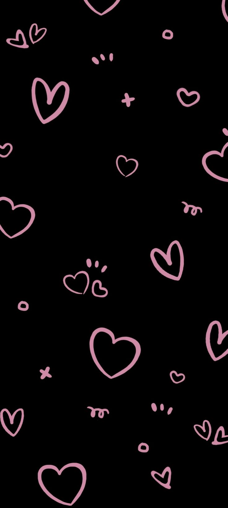 pink hearts are drawn on a black background