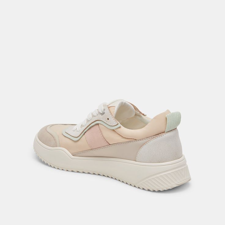 LAVINE is oh-so-cool in neutrals and nylon. Run around all day long in this modern, sporty sneaker. Nylon + Leather Upper Rubber Outsole Textile Lining Synthetic Sock Imported Sporty Sneakers, Latest Fashion, Leather Upper, Sneakers, Leather