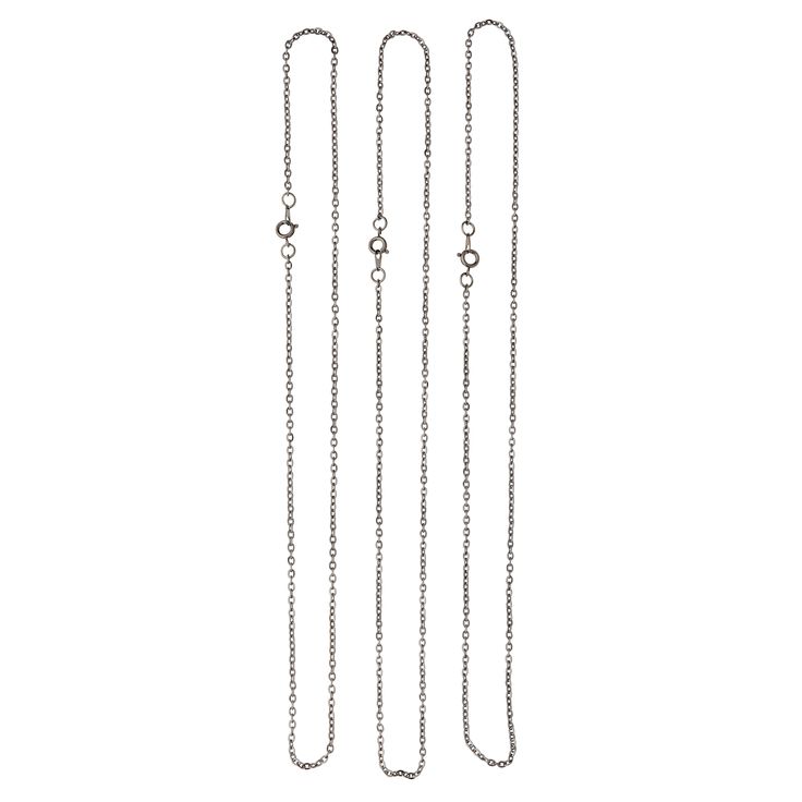 three long chain necklaces on a white background