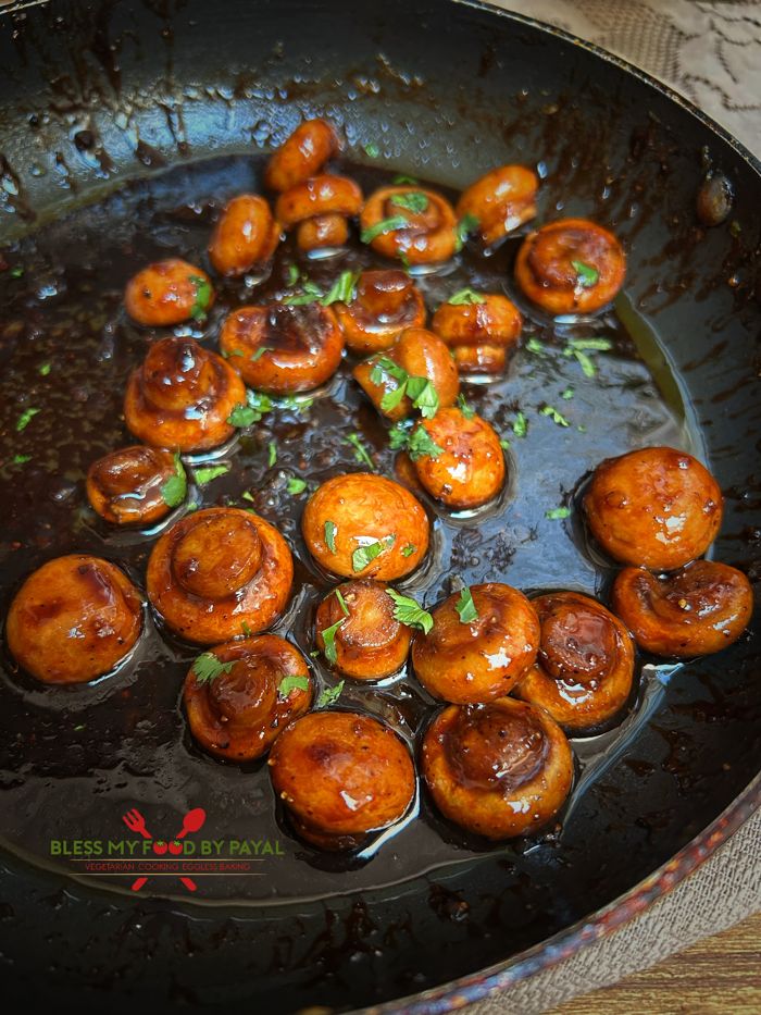 some food is cooking in a pan on the table