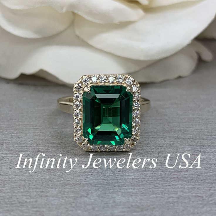 Emerald Engagement Ring, Emerald Green Engagement Ring, Moissanite Halo Engagement Ring, Anniversary Ring, 14k Yellow Gold #UniqueRings #PromiseRing #UniqueRing #BirthdayGift #GreenStone #MayBirthstone #MoissaniteRing #MothersDayGift #EmeraldHaloRing #EngagementRing Emerald Ring Design, Green Engagement Rings, Moissanite Engagement Ring Halo, Gold Halo, Emerald Engagement, Yellow Gold Setting, Ring Pictures, Mothersday Gifts, Dream Engagement Rings