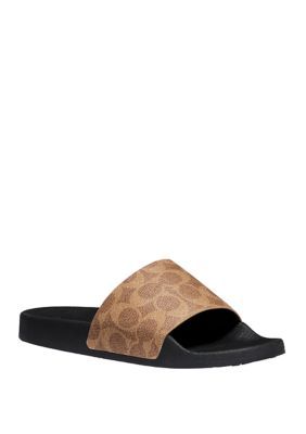 Complete with a sporty silhouette, these slide sandals are printed with a stylized COACH 'C' logo. | COACH Women's Udele Sport Slide Sandals, Tan, 9M Trendy Open Toe Sports Sandals, Logo Slip-on Sandals For Summer, Flat Sandals With Logo For Summer, Modern Sandals With Logo For Summer, Summer Flat Sandals With Logo, Modern Logo Sandals For Summer, Summer Slip-on Sandals With Logo, Summer Beach Slides With Logo, Logo Open Toe Slides For Beach