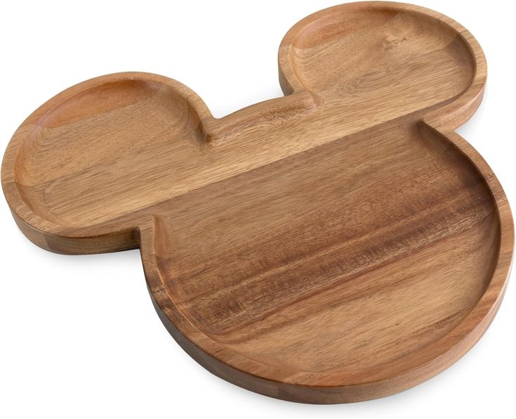 a wooden mickey mouse shaped dish on a white background