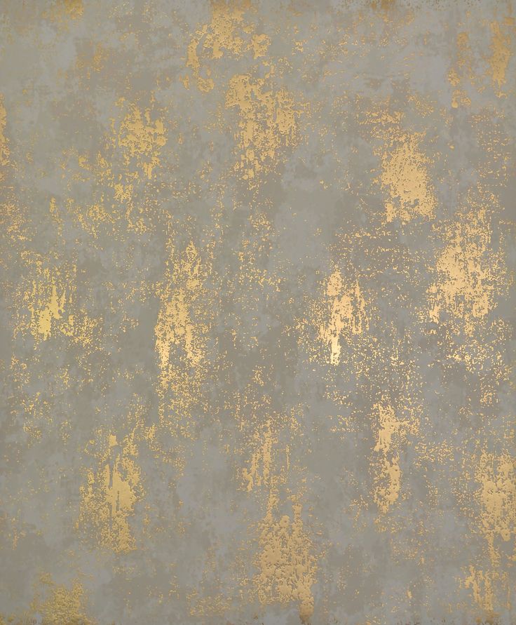 an old, dirty wall with yellow paint on it