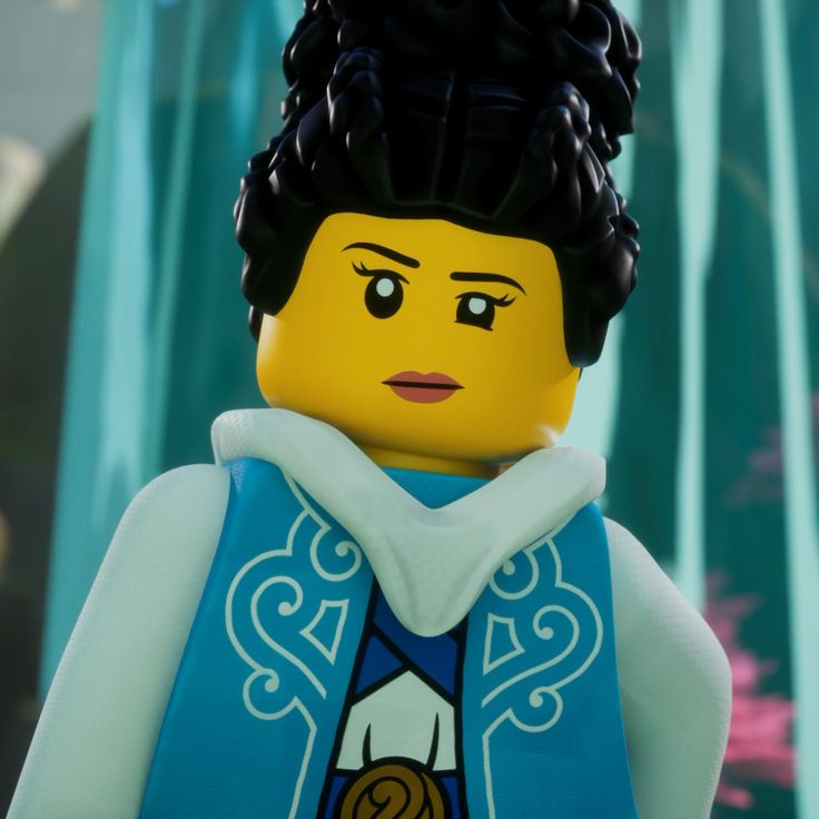 the lego movie character is wearing a blue vest and white shirt with an elaborate crown on his head