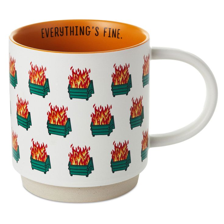 an orange and white coffee mug with flames on it that says everything's fine