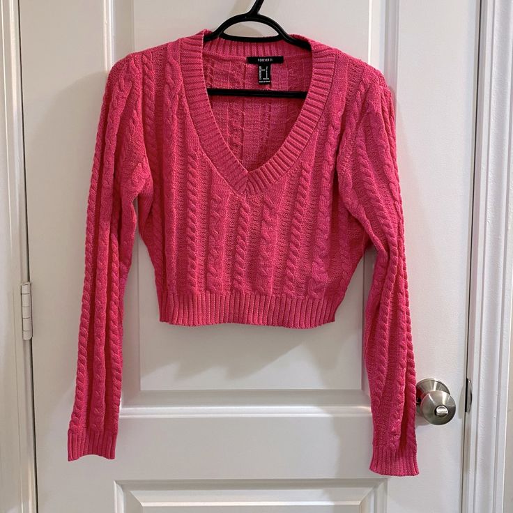 Never Worn At All, Perfect Condition. Cute Bright Pink Cropped Cable Knit V Neck Sweater From Forever 21. Material Is Stretchy And Soft So Even Though It Is Form Fitting It Doesn’t Feel Like It Is Squeezing You. Fitted Trendy Sweater By Forever 21, Fitted Forever 21 Sweater For Spring, Forever 21 Fitted Sweater, Forever 21 Trendy Long Sleeve Sweater, Trendy Long Sleeve Sweater From Forever 21, Forever 21 Fitted Casual Sweater, Trendy Long Sleeve Sweater By Forever 21, Fitted Casual Sweater By Forever 21, Forever 21 Trendy Long Sleeve Crop Top