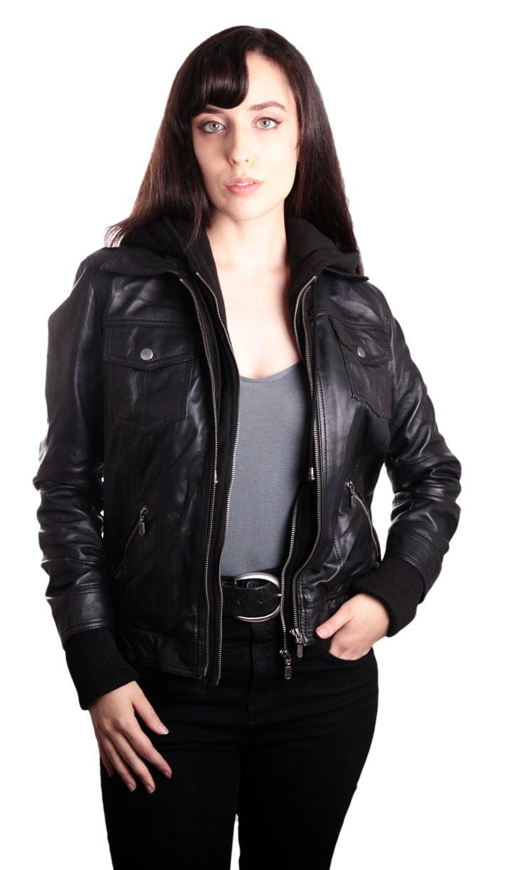 Women's leather jacket with a hoody. Slim-fit women's leather jacket. Zippered mid-section. Detachable Mid-Section cotton fleece with hoodie hoodie. Two exterior pockets with flaps. Rib on wrists and waistline. Soft, supple leather Genuine leather. This women's leather jacket is soft, warm, and comfy. You will be looking classy and snug through the winter months in this leather jacket. Two Front Snap Button Chest Pockets Two Lower Diagonal Zippered Hand Warmer Pockets Zippered Removable inner Mi Fitted Leather Jacket With Detachable Hood For Fall, Fitted Leather Hooded Jacket For Fall, Winter Fitted Biker Jacket With Double-lined Hood, Leather Biker Jacket With Double-lined Hood, Winter Biker Jacket With Double-lined Hood, Fitted Leather Hooded Jacket With Double-lined Hood, Fitted Hooded Leather Jacket For Cold Weather, Fitted Biker Jacket With Double-lined Hood For Fall, Fall Hooded Leather Jacket With Padded Collar