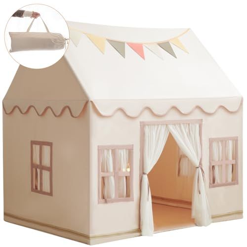 a toy house with curtains and windows on the outside, in front of a white background