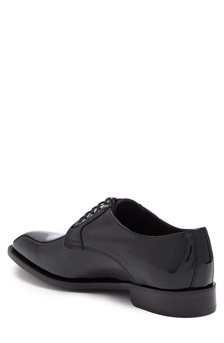 Shiny patent leather perfects this Derby style shoe with Italian crafting. 1/2" heel Lace up Plain toe Leather upper, lining and sole Made in Italy Patent Leather Pointed Toe Oxfords With Branded Insole, Business Oxfords With Rubber Heel Cap In Patent Leather, Patent Leather Oxfords With Branded Insole, Classic Patent Leather Oxfords With Leather Sole, Business Casual Patent Leather Dress Shoes With Rubber Sole, Patent Leather Cap Toe Oxfords With Rubber Sole, Classic Patent Leather Almond Toe Oxfords, Classic Patent Leather Cap Toe Oxfords, Modern Patent Leather Plain Toe Oxfords