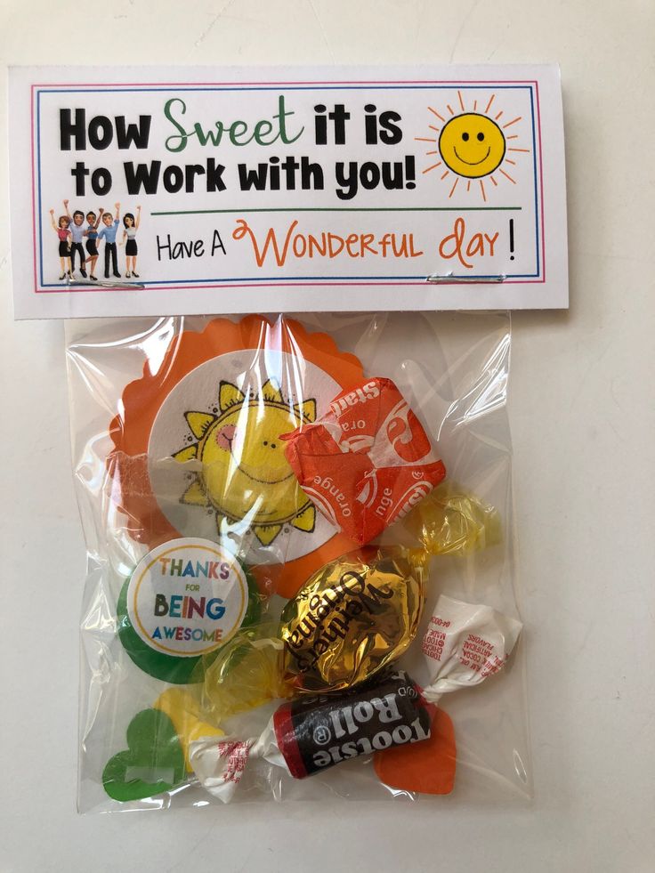 there is a bag of candies in front of a sign that says how sweet it is to work with you