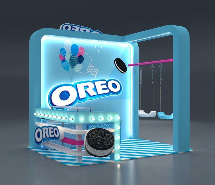 an ice cream stand with oreo cookies on the front, and a lit up display behind it