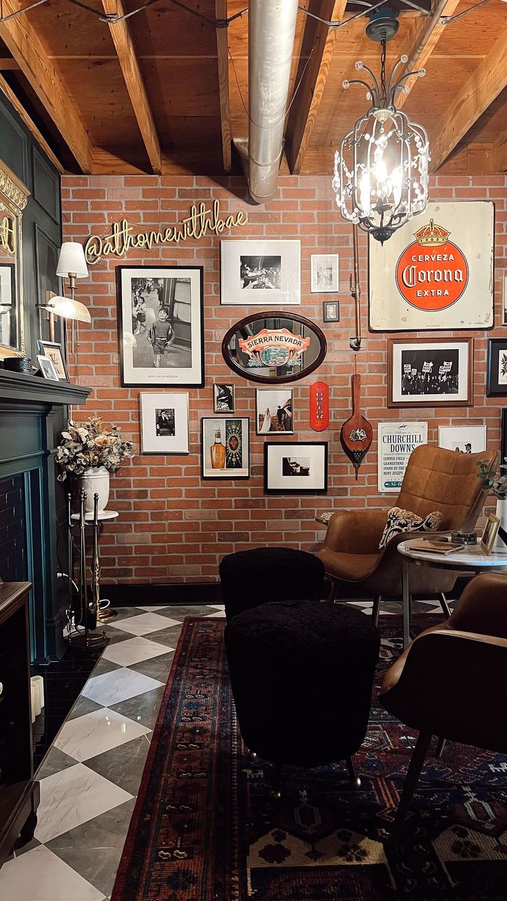 a living room filled with furniture and pictures on the wall