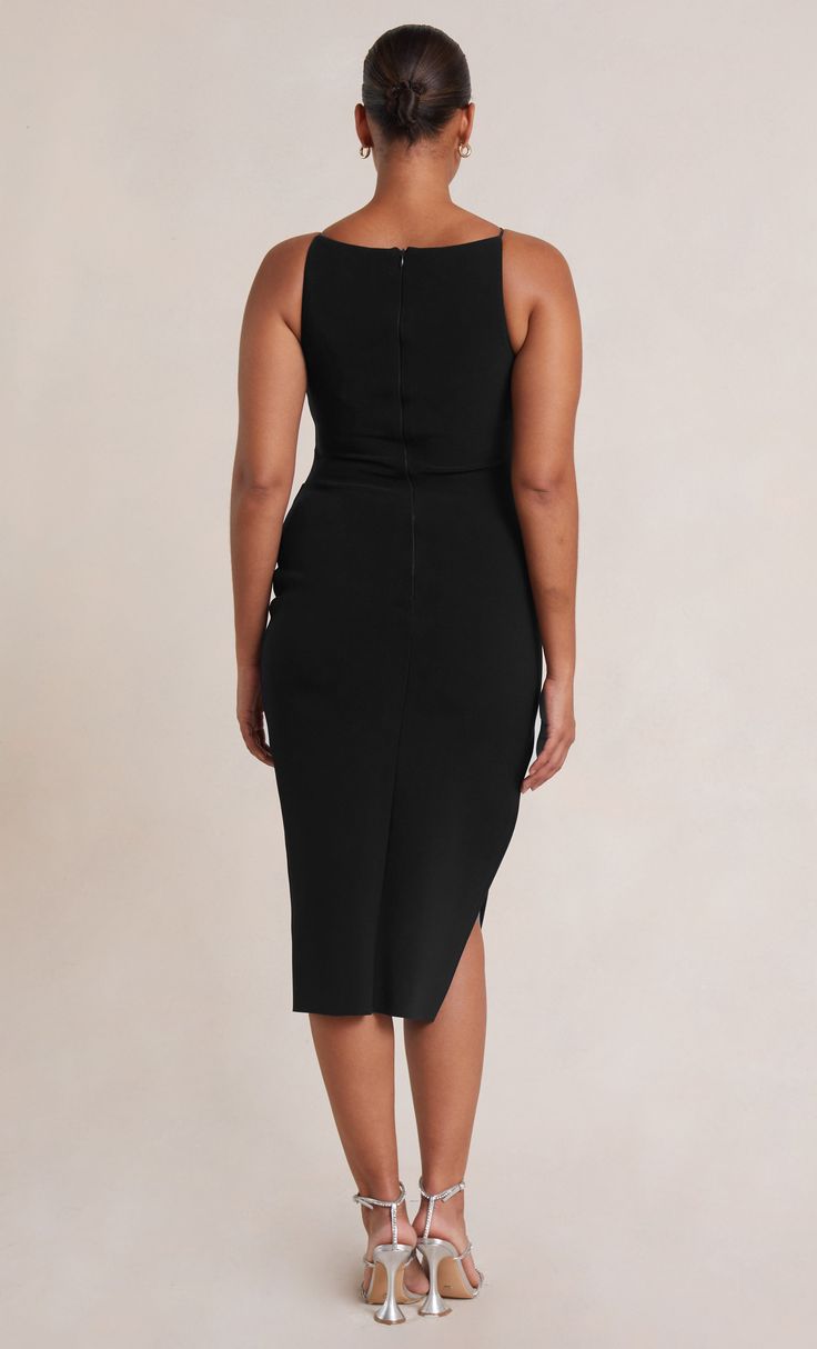 Sleeveless high neck midi in a timeless silhouette that flatters all body shapes. The midi dress is cut from a stretch bonded crepe fabric that cinches in the body and skims the silhouette. The Be Mine Tuck Midi Dress features a slight gathering detail at the waist and hips for a more comfortable fit. Chic Sleeveless Midi Dress In Elastane, Chic Midi-length Sleeveless Elastane Dress, Fitted Black Sleeveless Dress With Side Slits, Flattering Midi Sleeveless Dress For Party, Sleeveless Midi Dress With Flattering Silhouette, Fitted Sleeveless Dress With Side Slits For Night Out, Flattering Midi Length Sleeveless Dress For Evening, Bodycon Sleeveless Midi Dress In Elastane, Bodycon Sleeveless Midi Dress