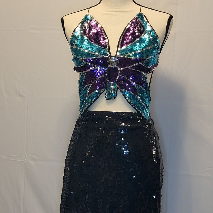 This Showstopping Sparkly Ensemble Can Be Yours! The Straps Are Very Long, So You Have Multiple Options On How You Tie The Back. This Dress Is One Piece With A Zipper In The Back Of The Skirt, Butterfly Is Teal And Purple. Never Worn! Size 12 X-Large Length: 35.8 Inch Bust: 40.9 Inch Waist Size: 32.3 Inch Hip Size: 39.4 Inch Strap Length: 72.8 Inch Dresses Butterfly, Butterfly Skirt, Shein Dress, Butterfly Dress, Dresses Backless, Clothing Design, Cami Dress, Waist Size, Fashion Inspo Outfits