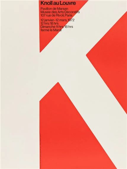 a red and white poster with the letter k on it's back side,