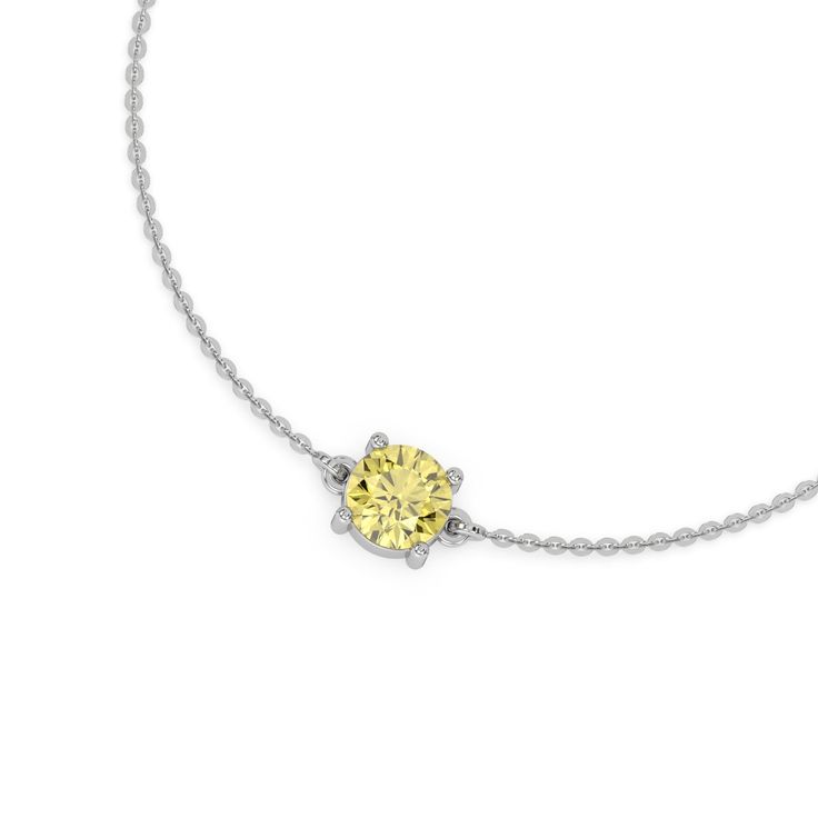 Elegante pulsera de diamantes redondos con solitario amarillo hecha con un elegante diamante redondo amarillo de talla brillante, engastado de forma segura en un engaste de cuatro puntas.

 Detalles:
 - Hecho a la medida
 - Peso del diamante: 1,00 CT, 1,25 CT, 1,50 CT, 1,75 CT, 2,00 CT, 2,50 CT, 3,00 CT
 - Número de diamantes: 1
 - Corte de diamante: redondo
 - Tipo de diamante: Diamante cultivado en laboratorio (CVD, HPHT)
 - Claridad del diamante: VS
 - Color del diamante: amarillo elegante.
 - Tipo de configuración: punta
 - Grosor de la pulsera: 4,45 MM
 - Ancho de la pulsera: 11,80 MM
 - Tipo de metal: Oro macizo de 14 quilates, Oro macizo de 18 quilates
 - Color de oro a elegir: oro amarillo, oro blanco, oro rosa
 - Certificado de joyería: todas nuestras joyas vienen con un certific Round Diamond Bracelet, Fancy Color Diamond Ring, Solitaire Bracelet, Colored Diamond Rings, Halo Necklace, Fancy Yellow Diamond, Round Solitaire, Halo Earrings, Halo Earrings Studs