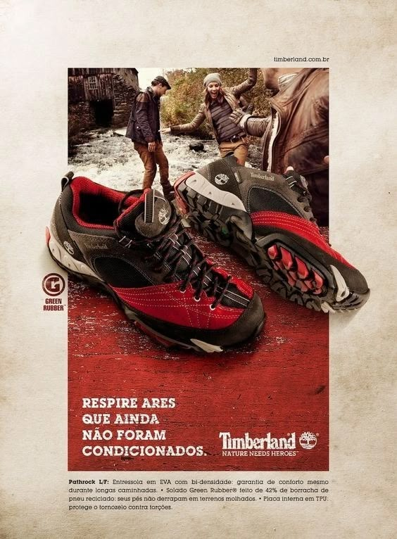 an ad for timberland featuring two men standing on shoes