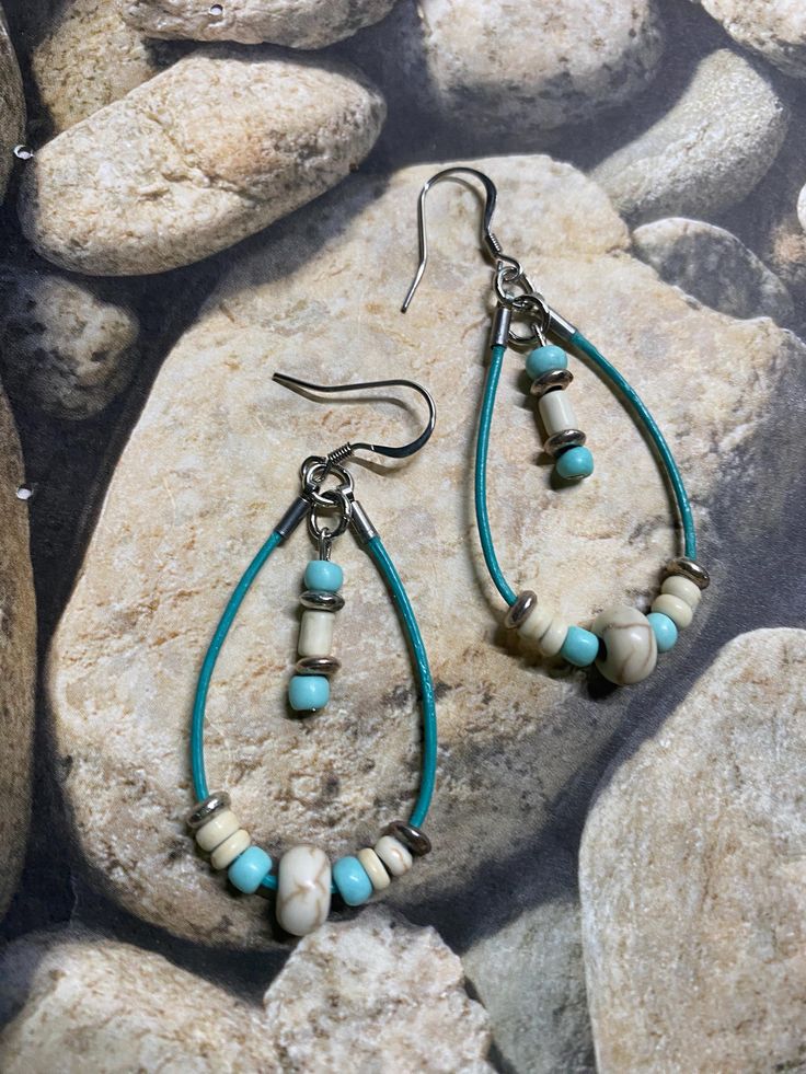 Add these lightweight leather earrings to your summer wardrobe and get noticed! I used various beads for a beachy vibe. Summer or year round, these hoops will make any outfit feel perfect Size: 2 inch drop approximately and .75 inch wide approximately Bohemian Small Hoop Earrings For Beach, Bohemian Beaded Hoop Earrings For Beach, Bohemian Small Hoop Earrings For Vacation, Beach Dangle Hoop Earrings, Handmade Turquoise Hoop Earrings For Beach, Adjustable Small Hoop Earrings For Beach, Adjustable Dangle Hoop Earrings For Beach, Bohemian Nickel-free Hoop Earrings For Beach, Casual Handmade Hoop Earrings For Beach