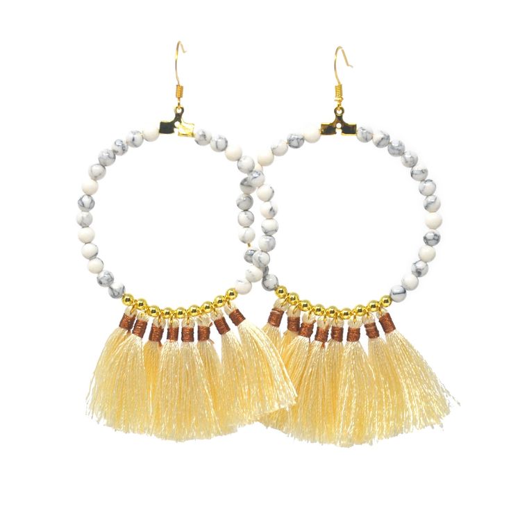 Add some spice to life with these adorable Ivory Tassel Hoop Earrings! A versatile style that is light-weight and easy to wear on vacation or any day of the year. Trendy Dangle Hoop Earrings For Vacation, Bohemian White Hoop Earrings For Beach, Summer Vacation Dangle Hoop Earrings, Bohemian Small Hoop Earrings For Vacation, White Beaded Earrings For Summer Vacation, Yellow Hoop Earrings For Summer Beach, Yellow Bohemian Hoop Earrings For Beach, Bohemian Yellow Hoop Earrings For Beach, White Small Hoop Earrings For Beach