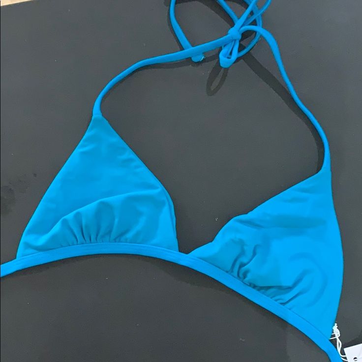 Super Cute, Great Quality Nwt Blue - Teal Colored Bikini Top. Size Medium Blue Swimwear With Built-in Bra And Tie-side Bottom, Blue Halter Top For Spring Beach Party, Fitted Blue Swimwear With Built-in Bra, Blue Summer Swimwear With Built-in Bra, Spring Blue Halter Top For Poolside, Blue Halter Top For Poolside Spring Season, Blue Beachwear Halter Top For Vacation, Blue Halter Top For Beach Vacation, Blue Halter Top With Built-in Bra For Beach Season