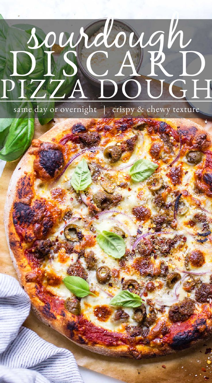 a pizza sitting on top of a wooden cutting board